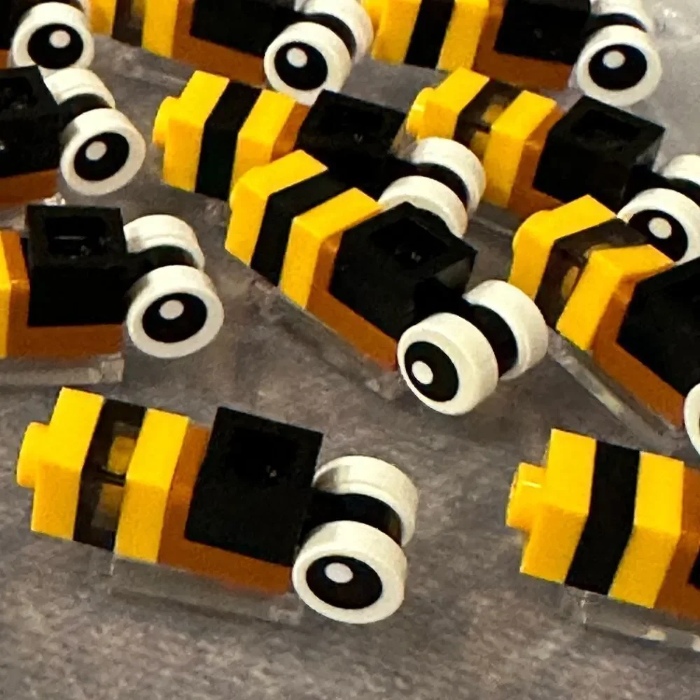 Lego Bee’s 15 total genuine Lego parts. Great to add to Lego flower sets.